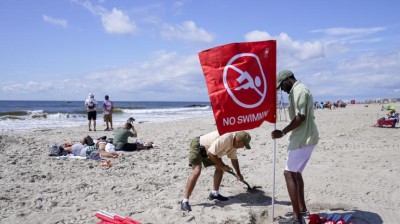 A woman attacked by a shark at Rockaway Beach